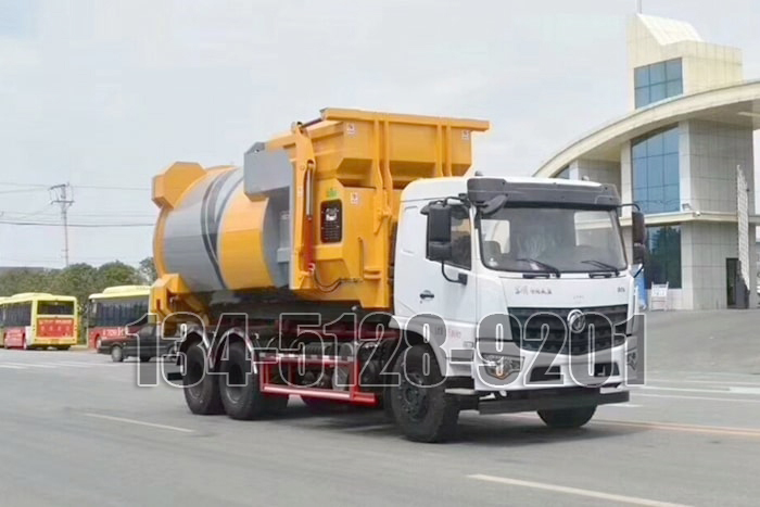 國(guó)六東風天龍車廂可卸式垃圾車右前側實拍圖片